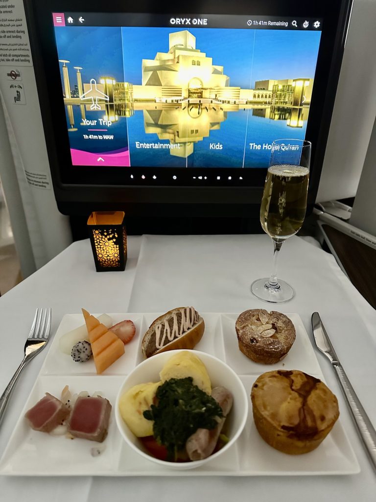 Qatar Airways Business Class meal. And champagne.